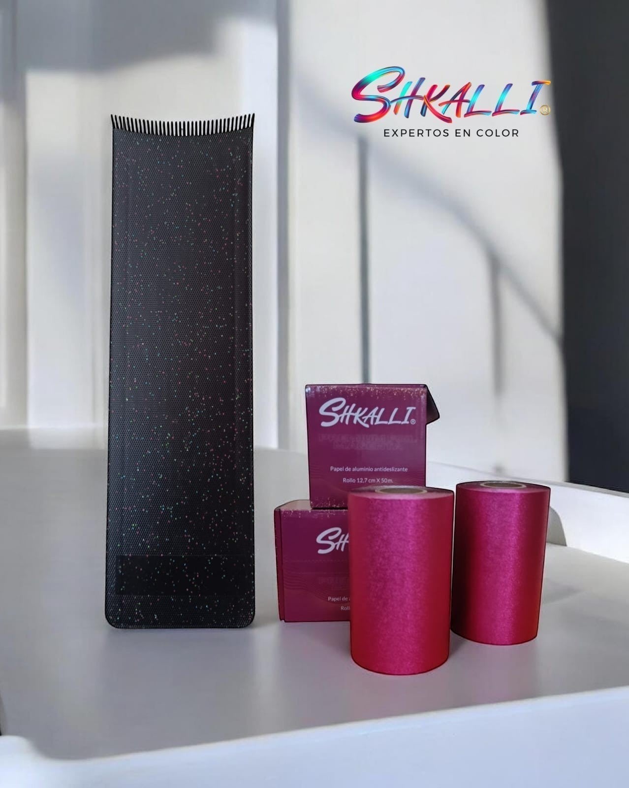 Kit promocional Shkalli Incluye tabla dentada y dos rollos de papel magenta de 50 mts